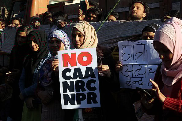 Getty Images : Women protesters and students of Jamia Millia Islamia (JMI) University protest against the controversial Citizenship Amendment Act (CAA) on February 14, 2020 in New Delhi, India |