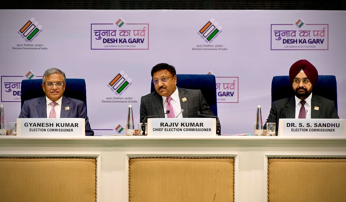 Chief Election Commissioner Rajiv Kumar (center), Election Commissioner Gyanesh Kumar, and Election Commissioner  Sukhbir S. Sandhu during the press conference on March 16, 2024. - AP