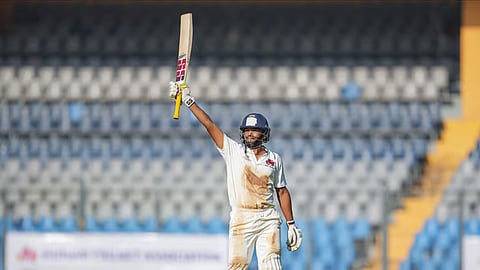 Musheer Khan celebrates his half century on Day 2 of the Ranji Trophy 2024 final between Mumbai and Vidarbha at the Wankhede Stadium.