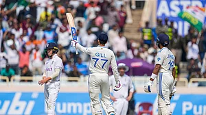 AP Photo/Ajit Solanki : Shubman Gill, centre celebrates his fifty runs on the fourth day of the fourth Test match between England and India in Ranchi.