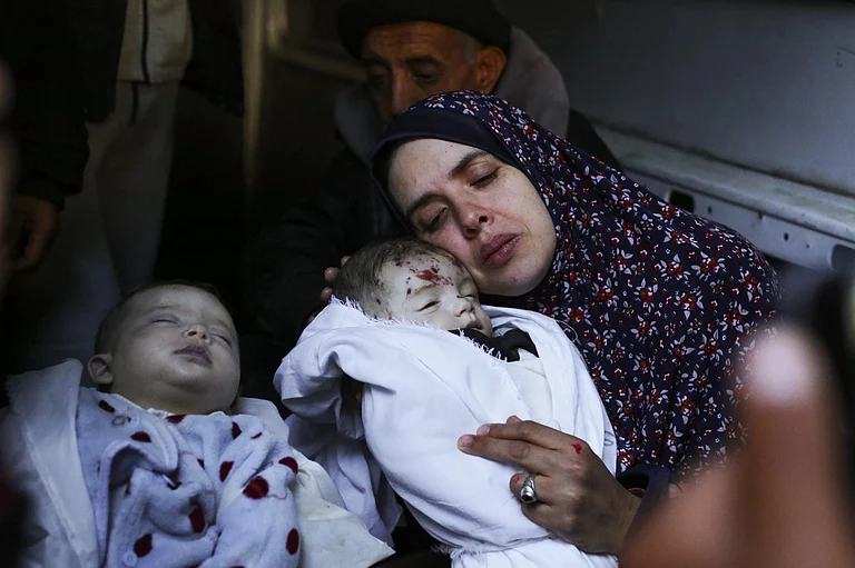 Woman with her twins who were killed by Israeli strike | - AP