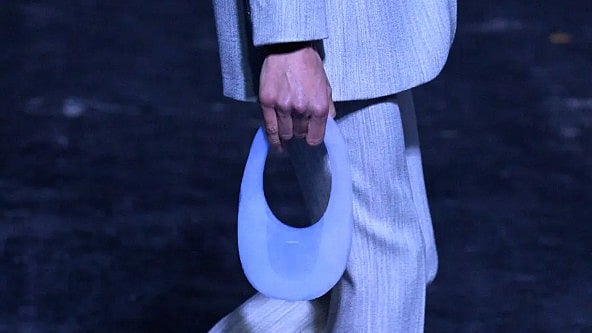 The Air Swipe bag resembles an egg-shaped, translucent clutch.  - Getty Images