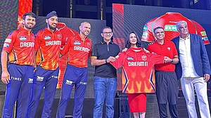 Photo: X/ @PunjabKingsIPL : Punjab Kings team players and franchise owners inaugurated the new jersey for the IPL 2024.