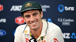 (Andrew Cornaga/Photosport via AP) : Australian captain Pat Cummins smiles during a press conference following their 172 run win in the first test against New Zealand at the Basin Reserve in Wellington, New Zealand, Sunday, March 3, 2024.