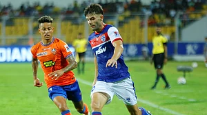 PTI : FC Goa's Noah Wail Sadaoui and Bengaluru FC's Javi Hernandez vie for the ball during their Indian Super League match at the Jawaharlal Nehru Stadium, Margao on March 14, 2024.