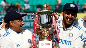 Photo: X/ @CricCrazyJohns : Sarfaraz Khan (L) and Dhruv Jurel with the trophy after winning the five-match Test series against England.