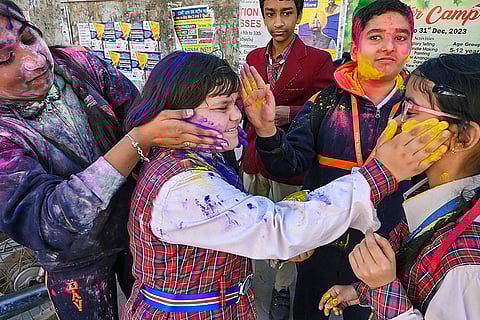 Students play Holi in Patiala