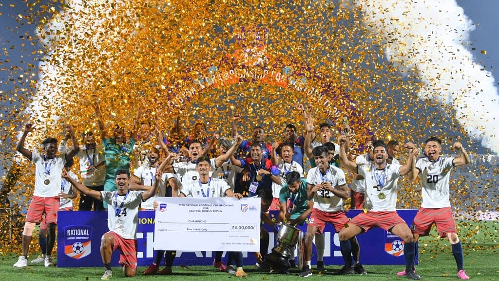 AIFF : Services Football Team with the trophy after beating Goa 0-1 in the 77th National Football Championship for the Santosh Trophy at the Golden Jubilee Stadium on Saturday, March 9. 