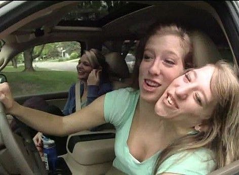 Abby and Brittany Hensel driving.