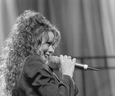 Mariah Carey performing(1990).