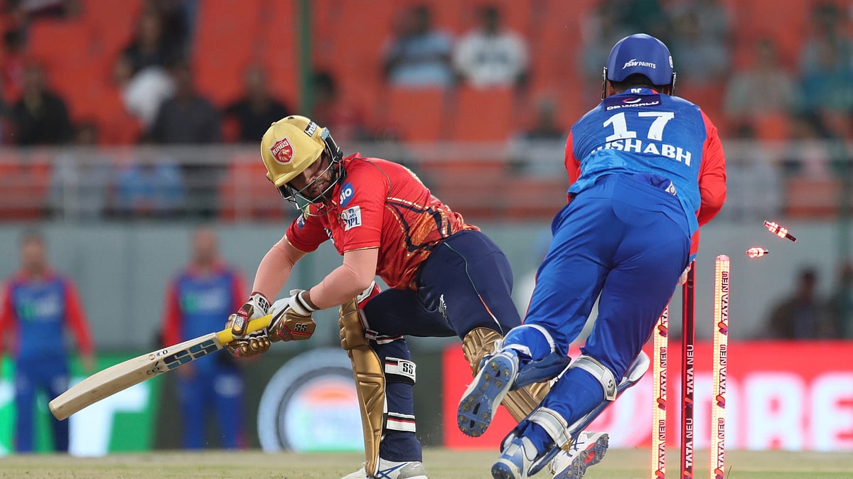 Delhi Capitals' Rishabh Pant, right, attempts to stump out Punjab Kings' Jitesh Sharma during the Indian Premier League cricket tournament match between Delhi Capitals and Punjab Kings in Mullanpur. - AP Photo/Pankaj Nangia