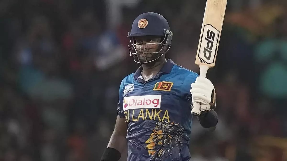 AP : Angelo Matthews celebrating after a half-century for Sri Lanka. 