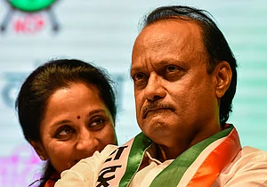 Getty Images : NCP leader Ajit Pawar and Supriya Sule at a 'Save the Constitution' meet held during the national convention of the NCP women's wing, at the YB Chavan Auditorium, on June 20, 2018 in Mumbai, India.
