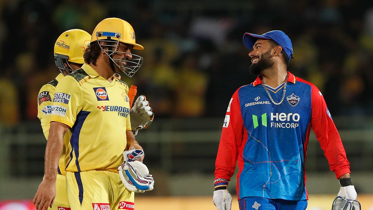 Delhi Capitals' captain Rishabh Pant, right, share a light moment with Chennai Super Kings' MS Dhoni at the end of the Indian Premier League cricket match between Delhi Capitals and Chennai Super Kings in Visakhapatnam, India, Sunday, March. 31, 2024. - (AP Photo/ Surjeet Yadav))
