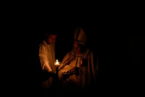 Easter vigil celebration in St. Peter's Basilica at the Vatican, Saturday, March 30, 2024