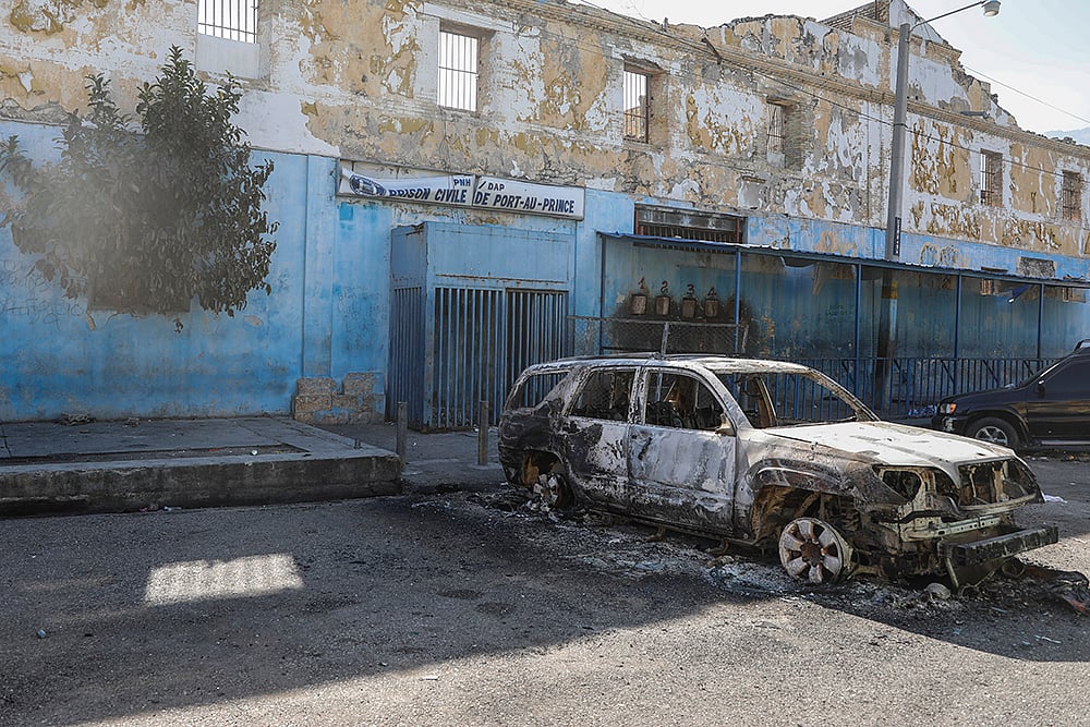 | Photo: AP/Odelyn Joseph : Haiti Prison Break