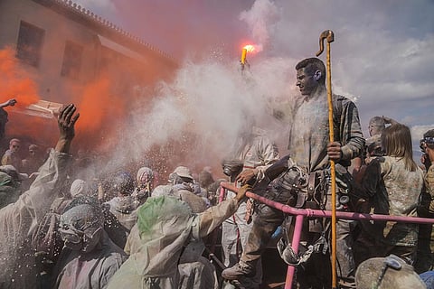 Colorful flour fight in Athens