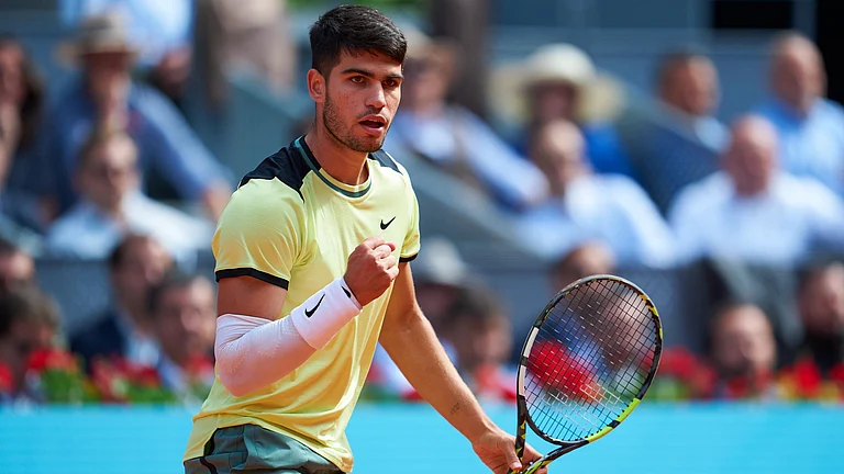 Carlos Alcaraz, who is in the hunt for a third straight title in Madrid, will now face seventh-seed Andrey Rublev for a place in the last four. - null