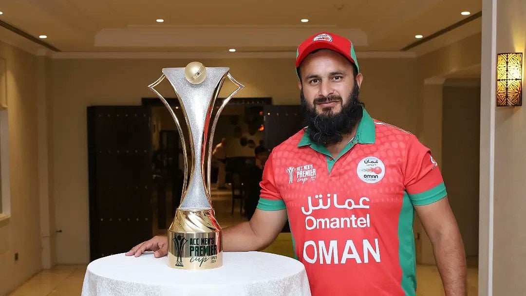 X/Oman Cricket : Oman captain Zeeshan Maqsood poses with the ACC Men's T20I Premier Cup.