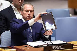 Getty%27s%20Images%20%3A%20Israeli%20Ambassador%20to%20the%20UN%20Gilad%20Erdan%20shows%20a%20video%20of%20drones%20and%20missiles%20heading%20toward%20Israel%20during%20a%20United%20Nations%20Security%20Council%20meeting%20on%20April%2014.