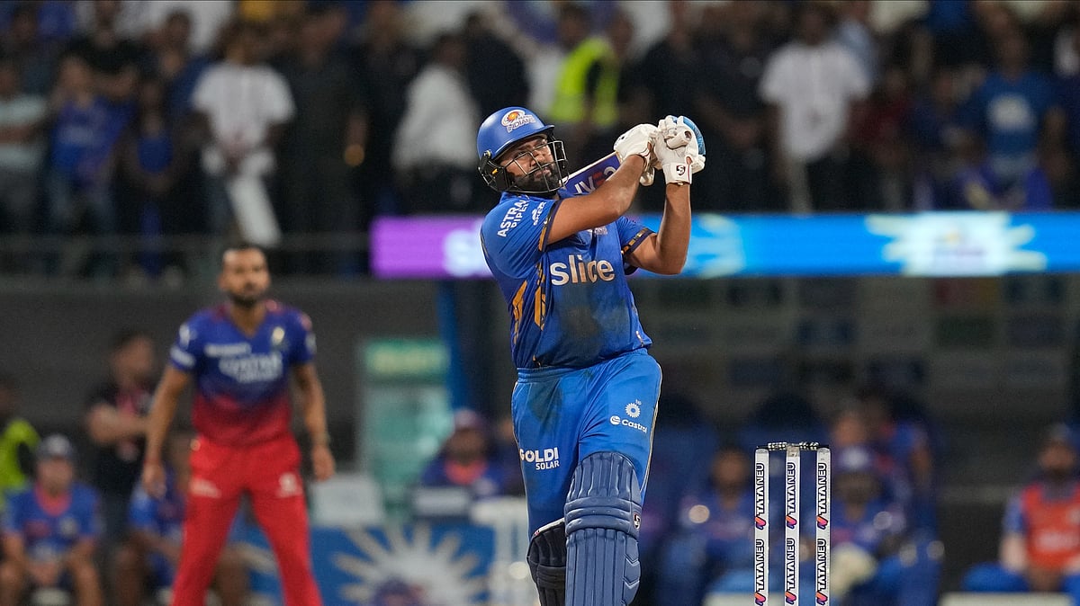 AP Photo/Rajanish Kakade : Mumbai Indians' Rohit Sharma plays a shot during the Indian Premier League cricket match between Mumbai Indians and Royal Challengers Bengaluru in Mumbai.