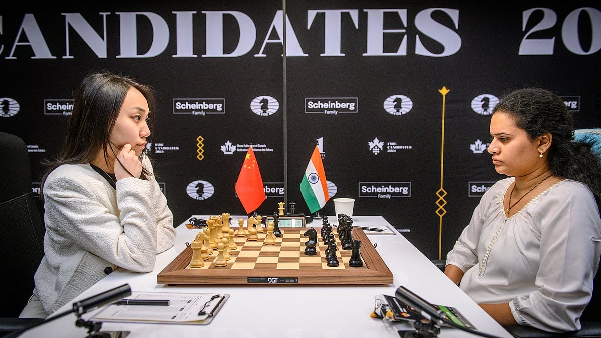 FIDE/Michal Walusza : Koneru Humpy in action against China's Tingjie Lei at the women's candidates tournament.