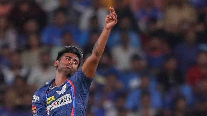 Lucknow Super Giants' Mayank Yadav bowls a delivery during the Indian Premier League cricket match between Lucknow Super Giants and Mumbai Indians in Lucknow - AP