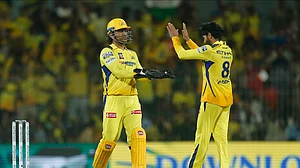 AP Photo/Parthi Bhan : Chennai Super Kings' Ravindra Jadeja, right, and MS Dhoni celebrate the dismissal of Kolkata Knight Riders' Angkrish Raghuvanshi during the Indian Premier League match between Chennai Super Kings and Kolkata Knight Riders in Chennai.