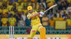 AP Photo/Surjeet Yadav : Chennai Super Kings' MS Dhoni hits a boundary during the Indian Premier League cricket match between Chennai Super Kings and Lucknow Super Giants in Lucknow.