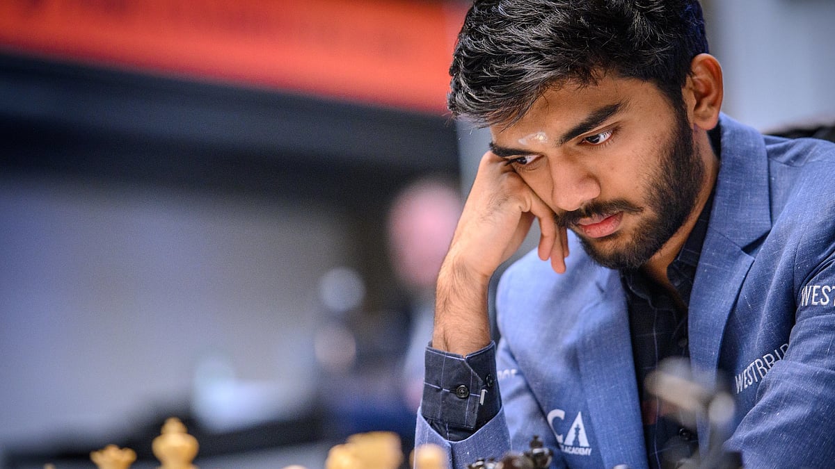FIDE/Michal Walusza : India's 17-year-old Grandmaster D Gukesh become the youngest-ever winner at Candidates chess, eclipsing the legendary Garry Kasparov's 40-year-old record.