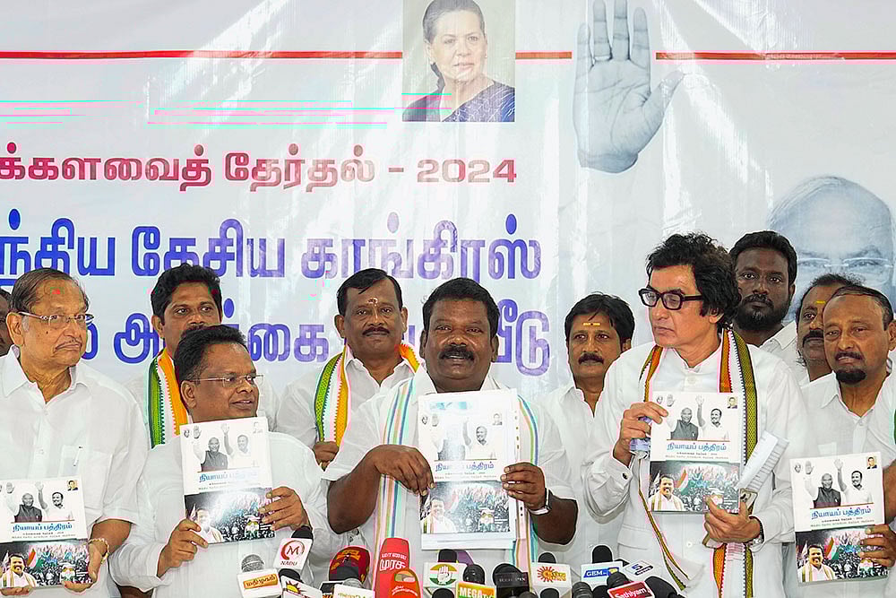 Photo: PTI/R Senthilkumar : Tamil version of Congress manifesto released