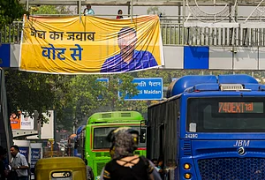 PTI : A banner hangs on a foot over bridge at ITO in support of Aam Aadmi Party (AAP) supremo and Delhi Chief Minister Arvind Kejriwal who is in judicial custody till April 15 in connection with a money-laundering case linked to the alleged Delhi excise policy scam, at ITO, in New Delhi, Friday, April 12, 2024.
