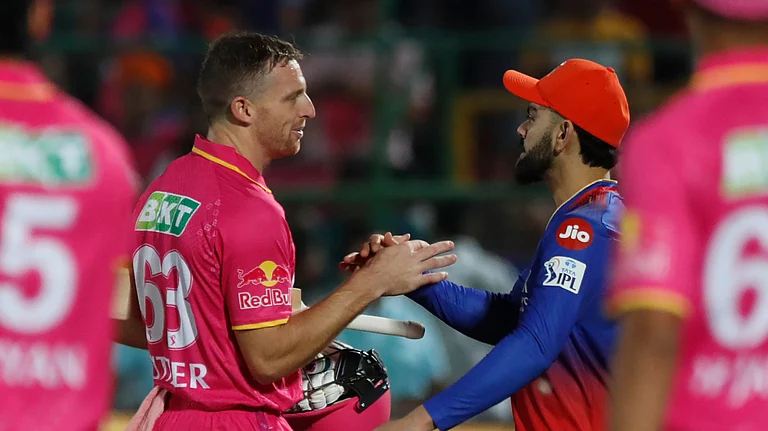 Royal Challengers Bengaluru's Virat Kohli congratulates Rajasthan Royals' Jos Buttler at the end of their Indian Premier League match in Jaipur on April 6, 2024. - AP/Pankaj Nangia