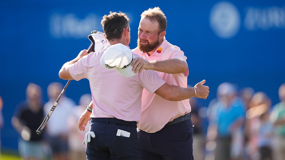 
Shane Lowry from Ireland celebrates alongside teammate Rory McIlroy from Northern Ireland after birdieing the 18th hole, securing a tie for the lead and concluding their first round at the PGA Zurich Classic golf tournament at TPC Louisiana in Avondale, LA on Thursday, April 25, 2024. - AP