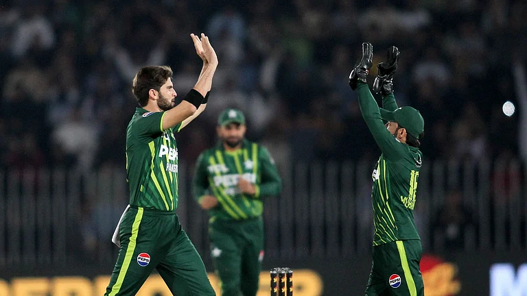 Pakistan's Shaheen Afridi and Mohammad Rizwan in action at the second T20I match against New Zealand at the Rawalpindi Cricket Stadium on April 20, Saturday. - null