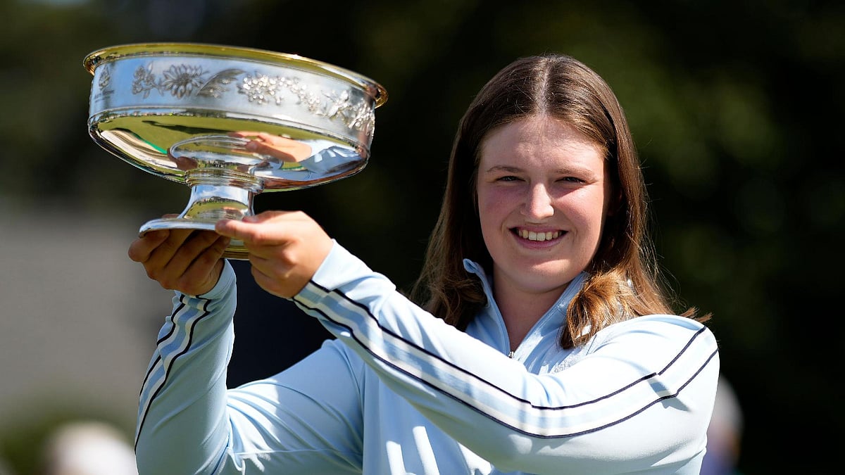 Matt Slocum/AP : Lottie Woad with the Augusta National Women’s Amateur trophy. 