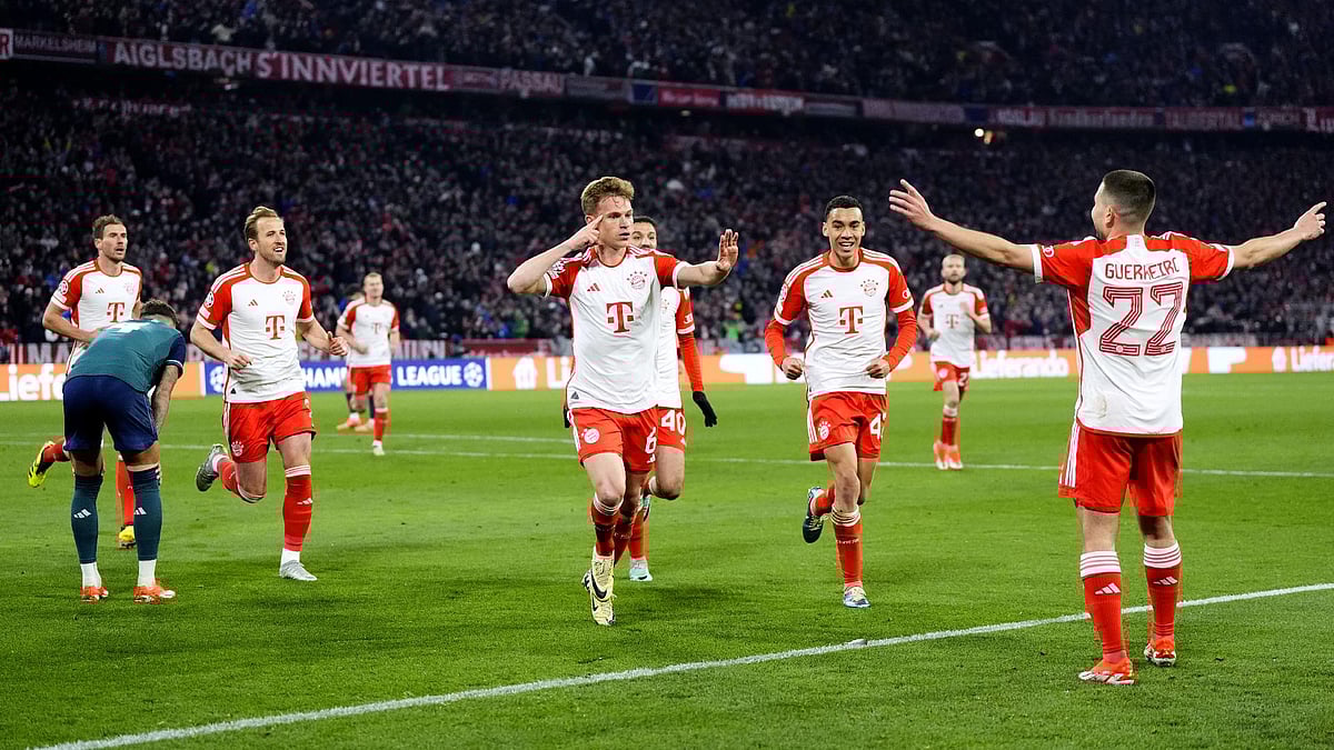 Joshua Kimmich, centre, sent Bayern Munich through with a bullet header in the UEFA Champions League quarter-final, second leg match against Arsenal. - Nick Potts/PA