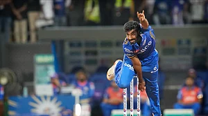 AP Photo/Rajanish Kakade : Mumbai Indians' Jasprit Bumrah bowls a delivery during the Indian Premier League cricket match between Mumbai Indians and Royal Challengers Bengaluru in Mumbai.