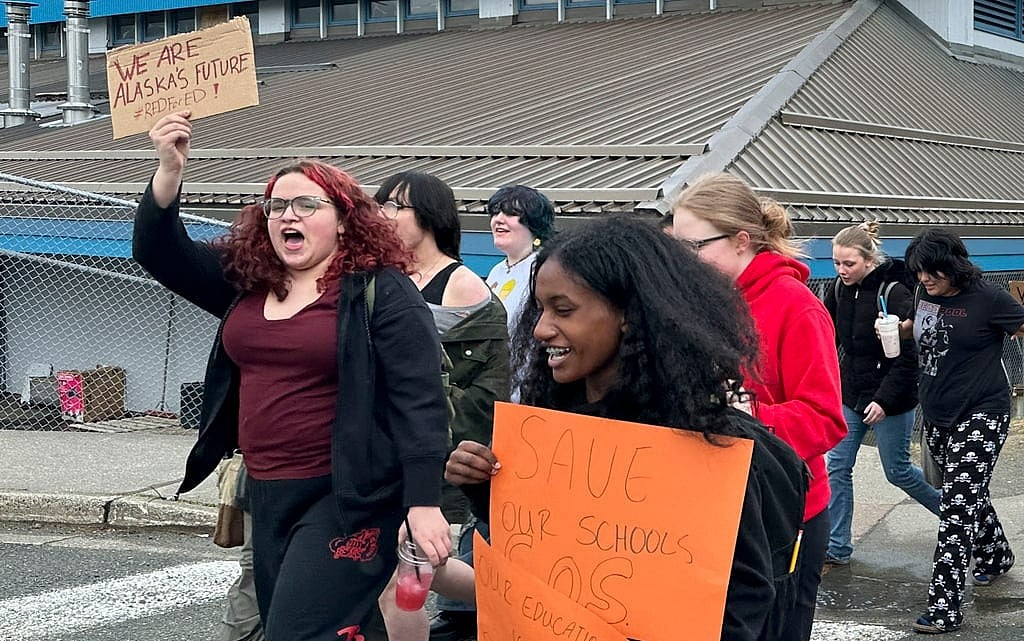 Students and supporters walk from Juneau-Douglas High School: Yadaa.at Kalé to the state Capitol, Thursday, April 4, 2024, in Juneau, Alaska.  - AP
