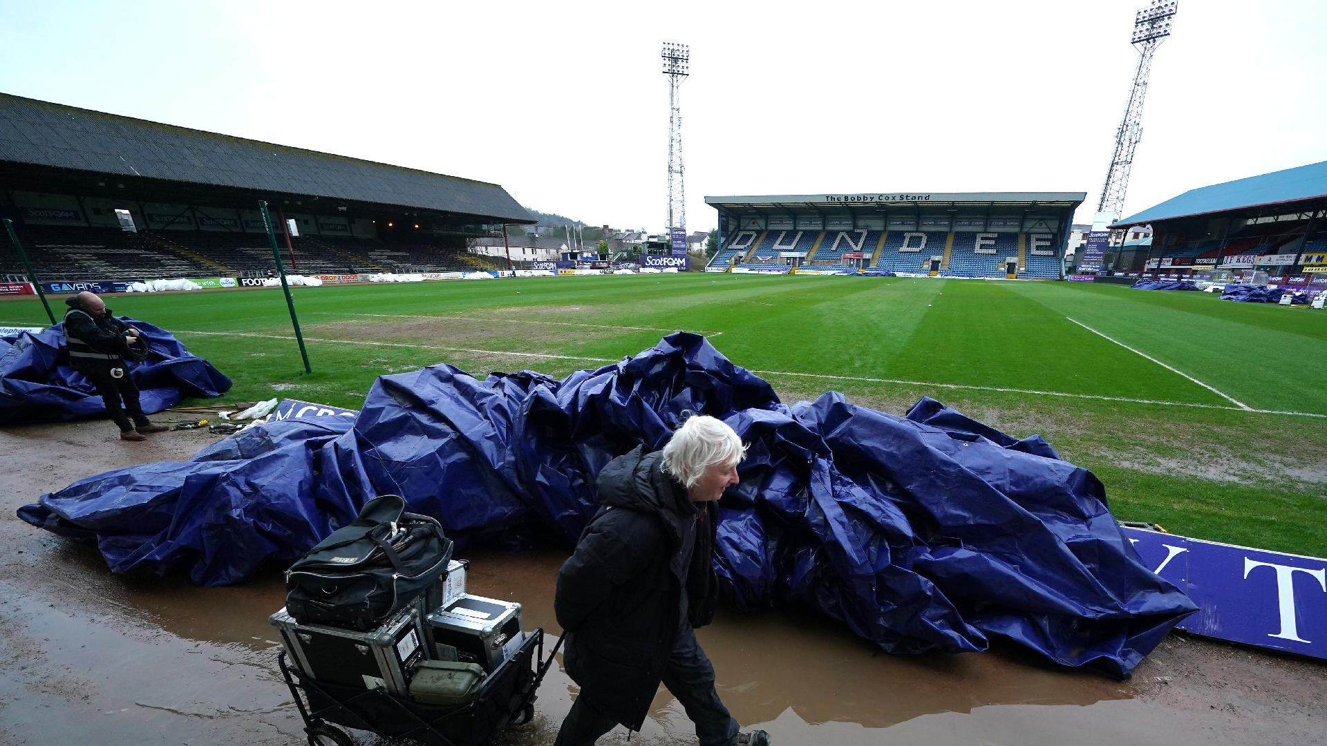  Andrew Milligan/PA : The Dens Park pitch was waterlogged.