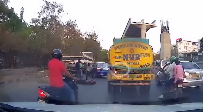 X : In the second incident, a car dashcam recorded a man getting brutally attacked with iron rod by another man in Bengaluru's Kalyan Nagar