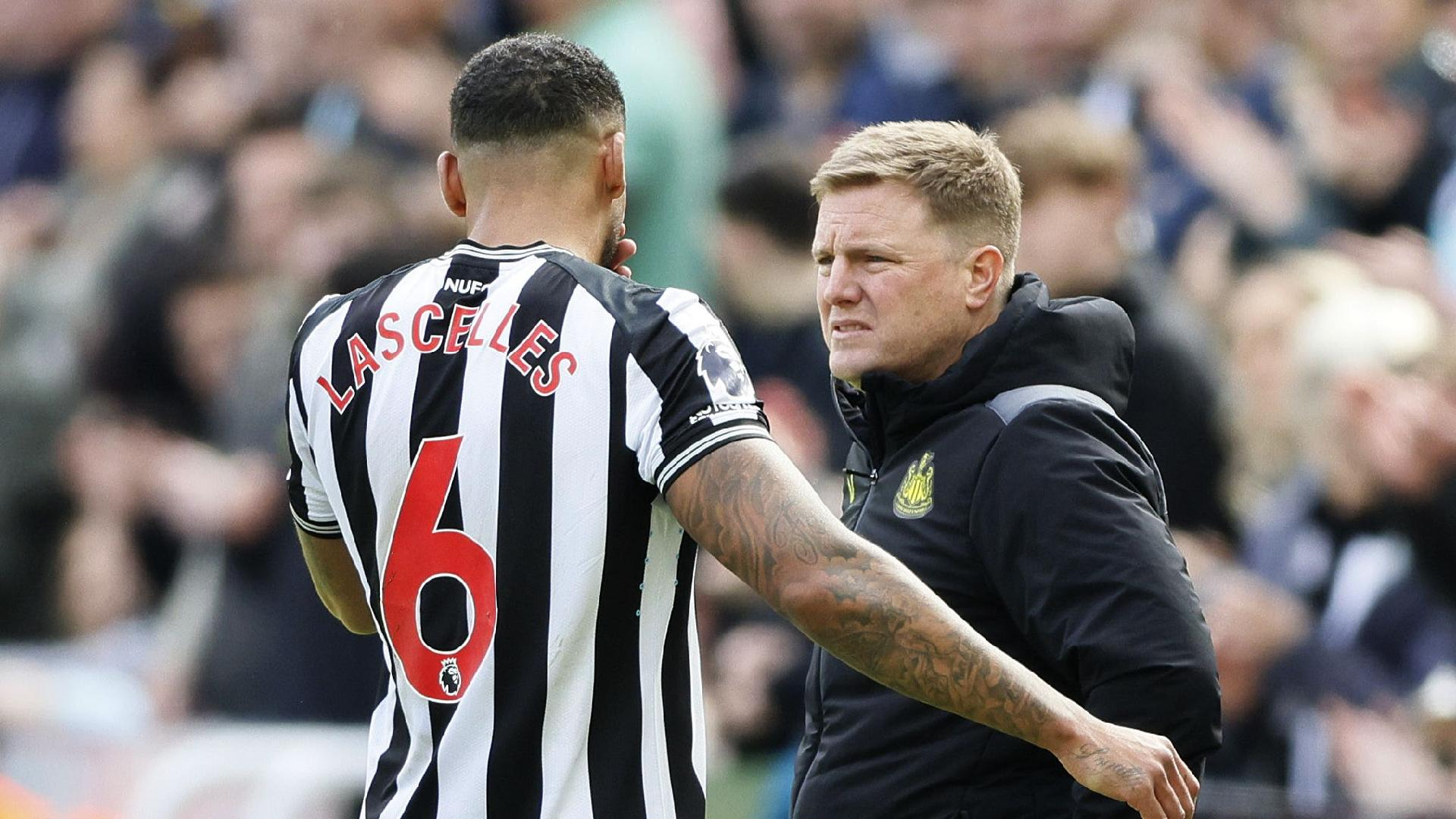 Richard Sellers/PA : Newcastle defender Jamaal Lascelles is consoled by head coach Eddie Howe after suffering a serious knee injury.