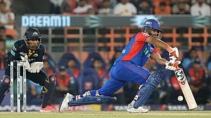 AP/Pravin Indrekar : Delhi Capitals captain Rishabh Pant (right) bats as Gujarat Titans wicketkeeper Wriddhiman Saha looks on, during match 32 of Indian Premier League 2024 in Ahmedabad on Wednesday (April 17).