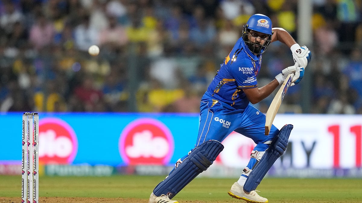 AP Photo/ Rafiq Maqbool : Mumbai Indians' Rohit Sharma plays a shot during the Indian Premier League cricket match between Mumbai Indians and Chennai Super Kings' in Mumbai.