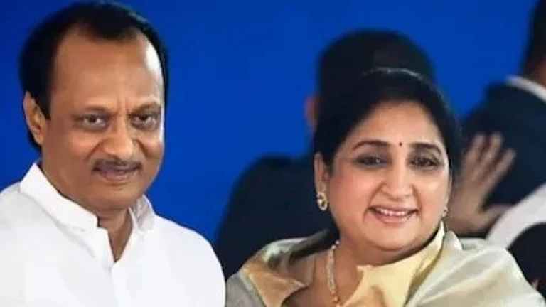 NCP (Ajit Pawar Faction) leader Ajit Pawar with wife Suunetra Pawar | - PTI