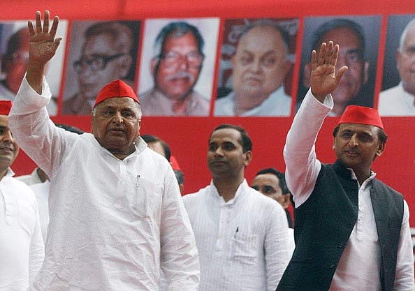 Mulayam Singh Yadav and Akhilesh Yadav during a public rally in New Delhi. - Getty Images