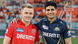 X/@PunjabKingsIPL : Punjab Kings skipper Sam Curran with Gujarat Titans captain Shubman Gill