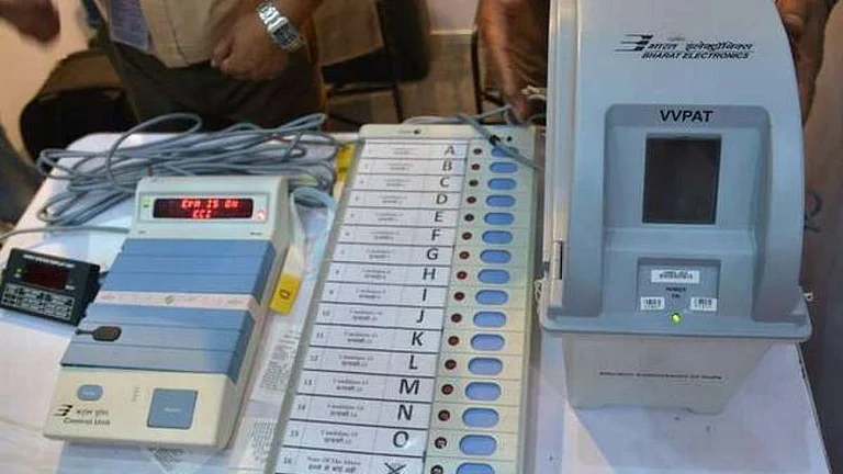 An Electronic Voting Machine (EVM) paired with a Voter Verifiable Paper Audit Trail (VVPAT) at a polling booth | - PTI