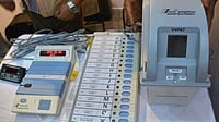 PTI : An Electronic Voting Machine (EVM) paired with a  Voter Verifiable Paper Audit Trail (VVPAT) at a polling booth |