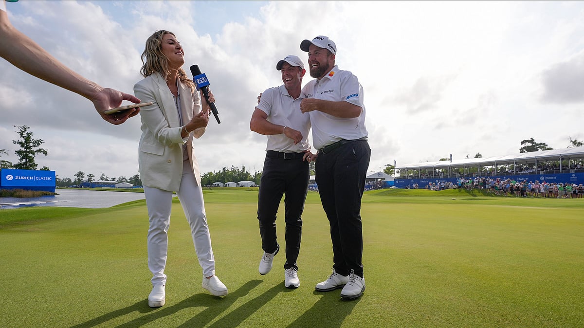AP : Rory McIlroy, of Northern Ireland, and teammate Shane Lowry, of Ireland, right, react while being interviewed after winning the PGA Zurich Classic.